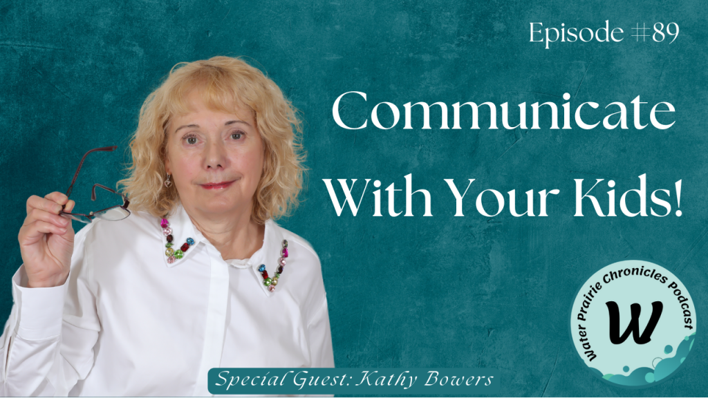 A graphic showing the guest, Kathy Bowers, and the title of the episode, "Communicate With Your Kids." Kathy has blond wavy hair and is wearing a white blouse with colored buttons along the edge of the collar. She is holding her glasses in her right hand as she looks at the camera. The graphic encourages parents to work on communication with their children.