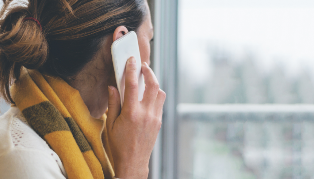 A woman talking on the phone.