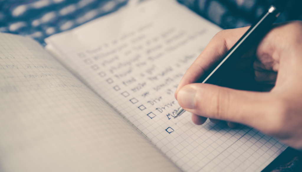 A notebook with a checklist.